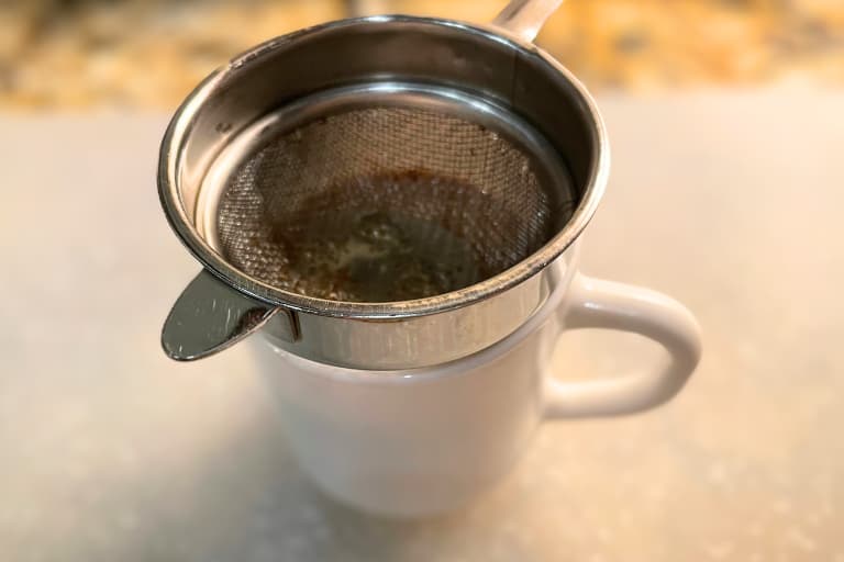 Straining of tea.