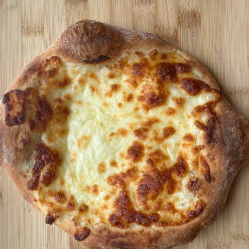 Pizza made from homemade pizza dough.