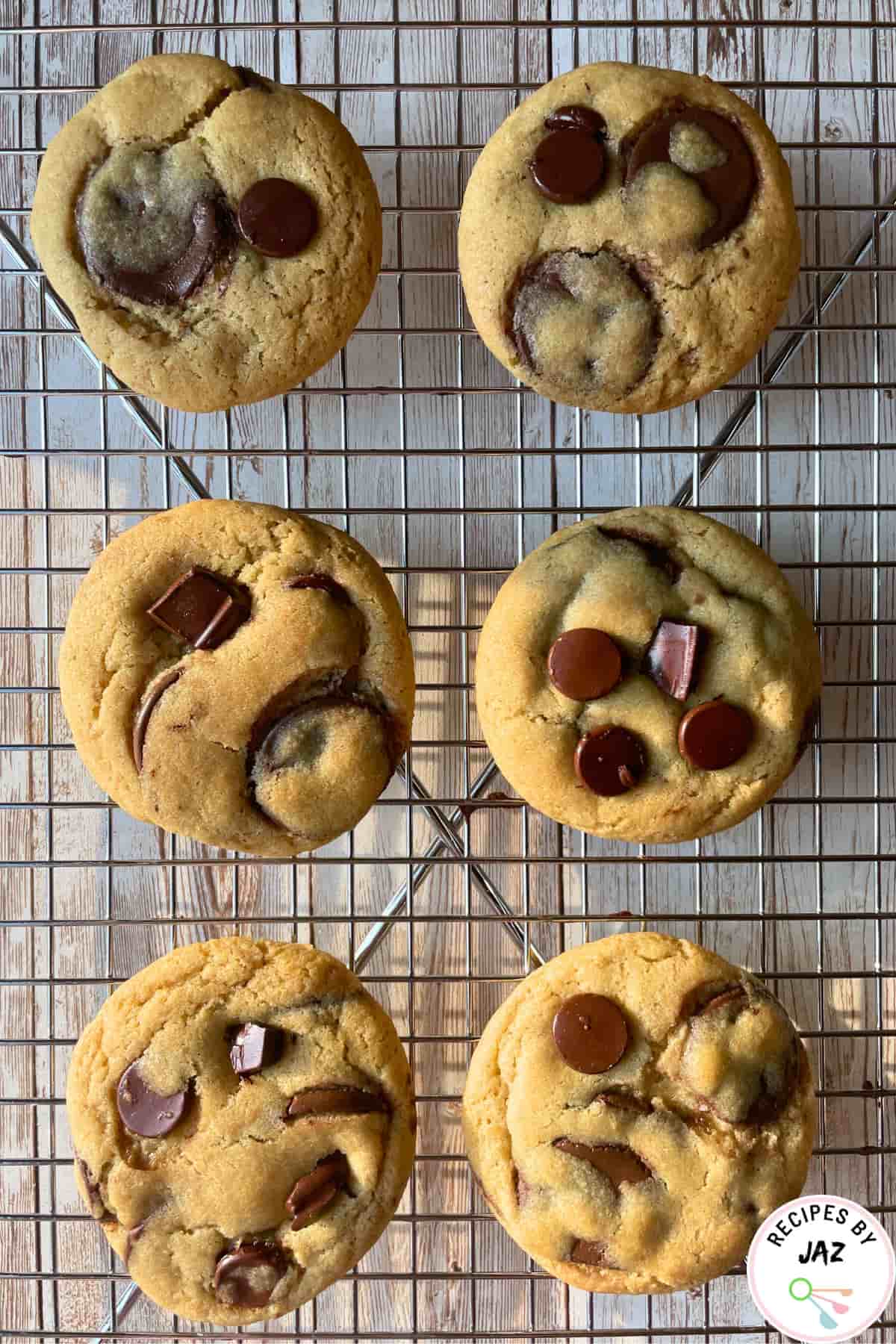 Chocolate chip cookies on a cooling rack.